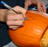 Carving a pumpkin